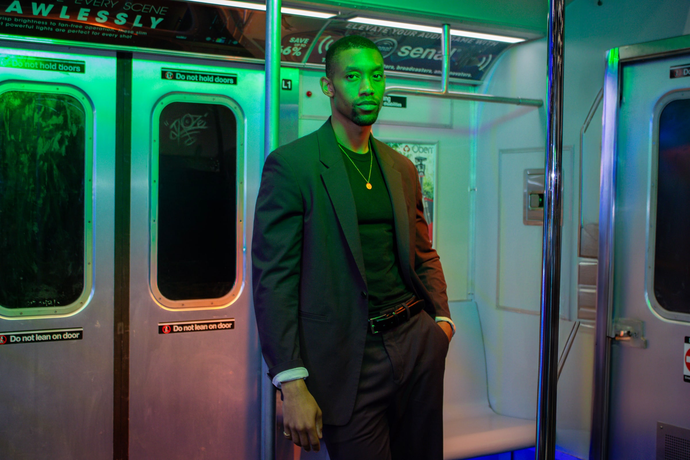 Editorial portrait on a subway car by Kristy Brown